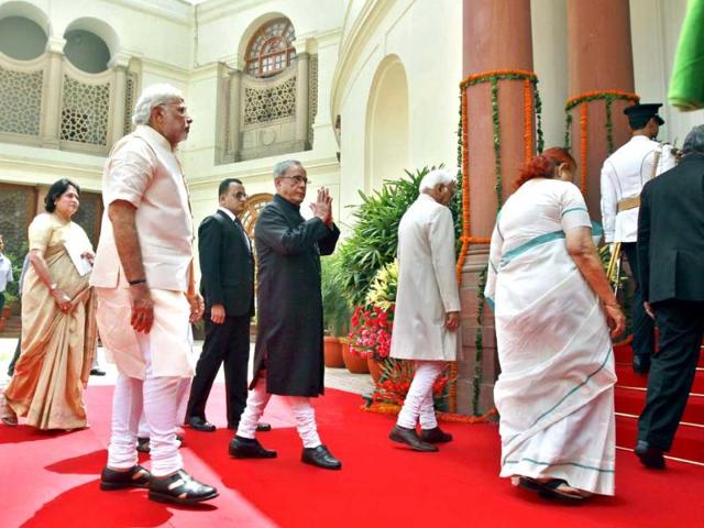 President Pranab Mukherjee arrives with Prime Minister Narendra Modi, vice president Hamid Ansari and Lok Sabha Speaker Sumitra Mahajan to address the joint session of Parliament in New Delhi. (Ajay Aggarwal/HT Photo)