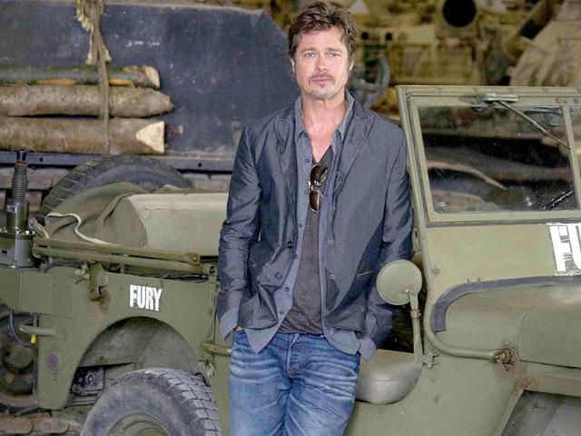 No honeymoon for Brangelina, it seems. After getting married on Saturday, Brad was back at work on Thursday, promoting his film Fury. The actor tried his best to keep his wedding band a secret, his hands safely in his pocket, but we did capture the image. Click on to have a dekko. 