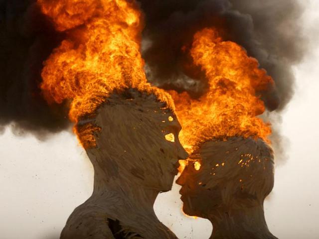 The art installation Embrace burns during the Burning Man 2014 "Caravansary" arts and music festival in the Black Rock Desert of Nevada. (Reuters Photo)