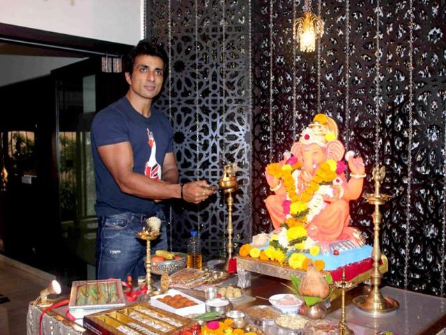 Actor Sonu Sood during the Ganesh Chaturthi celebrations at his residence in Mumbai on Aug 29, 2014. (Photo: IANS)