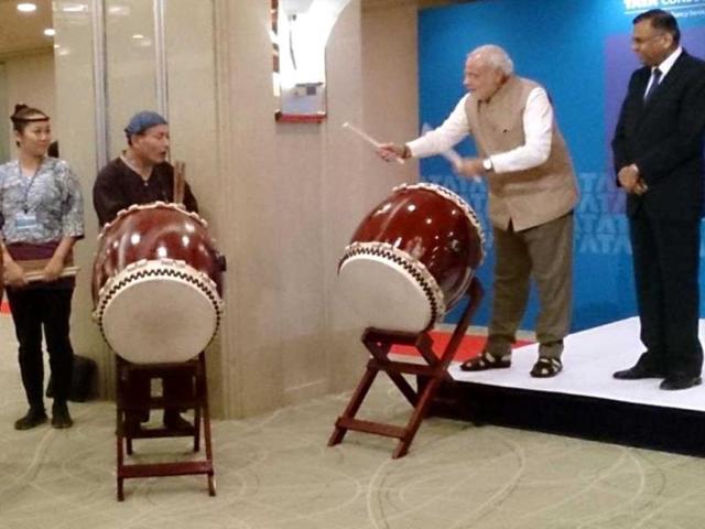 PM Modi plays the Japanese Taiko drum in Tokyo. (Photo Courtesy: @MEAIndia)