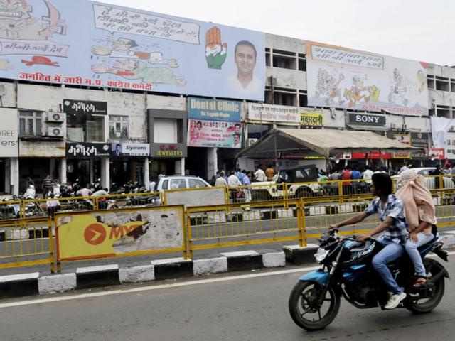 The-Congress-is-using-cartoons-to-target-the-ruling-BJP-Huge-hoardings-have-been-put-up-at-Roshanpura-in-Bhopal-Mujeeb-Faruqui-HT-photo