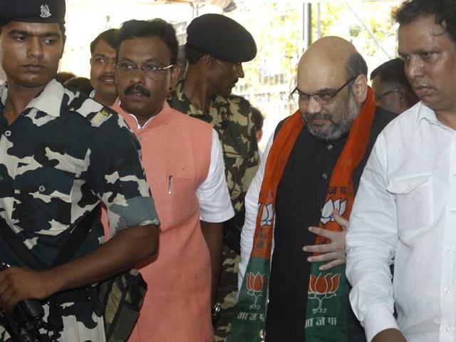 BJP chief Amit Shah was given a tumultuous welcome by thousands of party activists and top leaders at the Mumbai airport. (Satish Bate/HT photo) BJP chief Amit Shah was given a tumultuous welcome by thousands of party activists and top leaders at the Mumbai airport. (Satish Bate/HT photo)