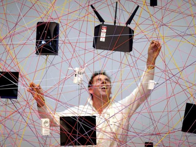 Devices produced by US manufacturer of computer networking equipment Netgear are displayed on a web during the IFA Electronics show in Berlin . (Reuters) Devices produced by US manufacturer of computer networking equipment Netgear are displayed on a web during the IFA Electronics show in Berlin . (Reuters)