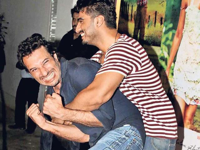 Homi Adajania and Arjun Kapoor captured having lots of fun at Finding Fanny screening. (Photos: Yogen Shah)