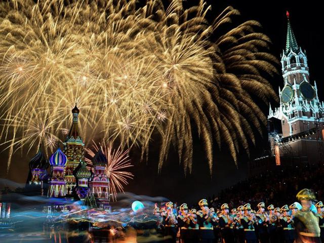 Russian Federation, Moscow: August 30, 2014 Fireworks light the sky above Saint Basil's Cathedral during the "Spasskaya Tower" international military and music festival on Red Square in Moscow. The festival will be held until September 7. (AFP/Kirill Kudryavtsev)