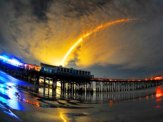 A Space X Falcon 9 rocket carrying the AsiaSat 6 mission for the United State Air Force turn's night into day during a early Sunday morning launch.(AP Photo)