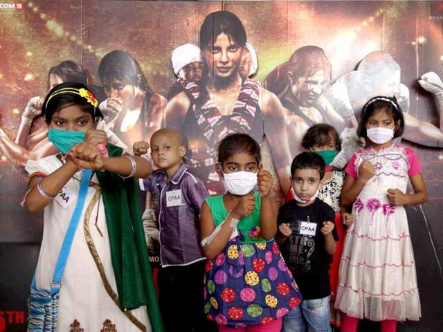 Kids suffering from cancer enjoy the special screening of movie of Mary Kom in Mumbai. (PTI photo)