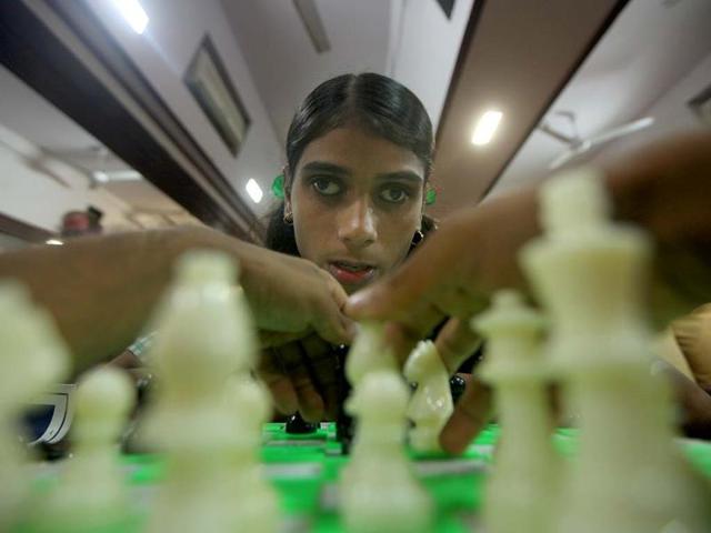 Blind children play chess during the inter-institute chess competition organized by HR College, Churchgate in Mumbai. (Kunal Patil/HT photo)