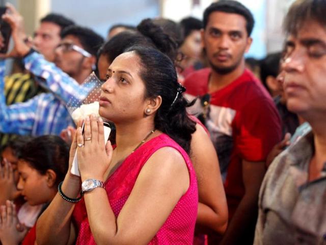 Thousands of pilgrims made their way to the Basilica of Mount Mary, Bandra, on the first day of Octave, the eight-day fair. (Vidya Subramanian/HT photo)
