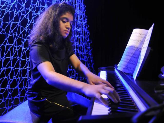 Pianist Anubhuti Agnihotri from Bhopal performs at a Club Literati event at Bharat Bhawan, in Bhopal on Tuesday. (Mujeeb Faruqui/HT photo)