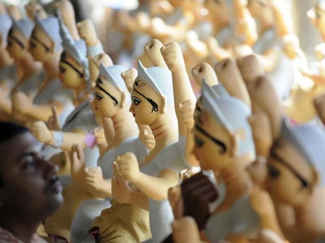 A sculptor makes idols of Goddess Durga ahead of Durga Puja, in Indore. (Amit K Jaiswal/HT photo)