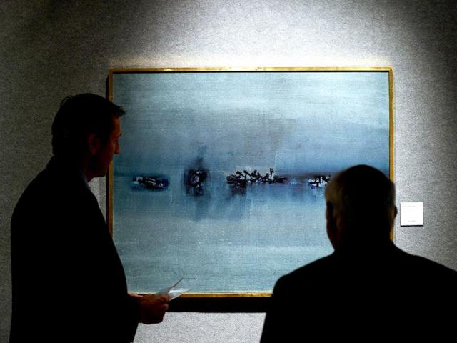 A-painting-by-Indian-artist-Vasudeo-Gaitonde-is-seen-on-display-at-the-Bonhams-auction-house-in-New-York-on-September-15-2014-Photo-AFP A-painting-by-Indian-artist-Vasudeo-Gaitonde-is-seen-on-display-at-the-Bonhams-auction-house-in-New-York-on-September-15-2014-Photo-AFP