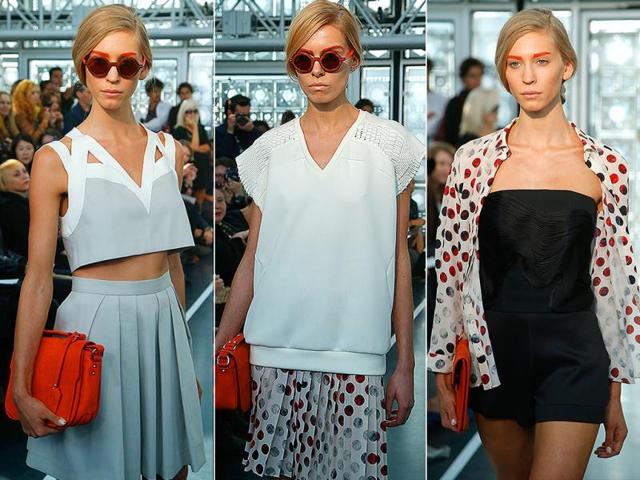 Models present creations for French fashion designer Christine Phung's Spring-Summer 2015 ready-to-wear fashion collection presented in Paris. (AP)