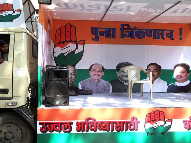Amid the seat sharing row, Congress' election campaign vehicle seen outside the party office without NCP poster in Mumbai. (Kunal Patil/HT photo)