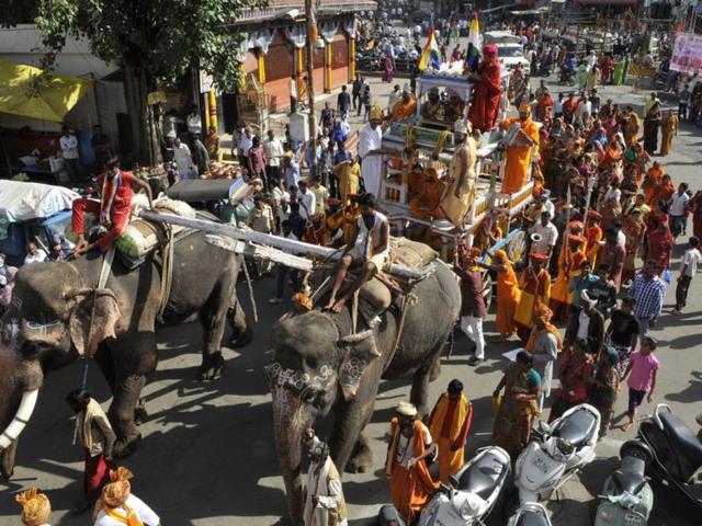 Members of Jain community take out a procession to celebrate 'Gajrath Mahotsav' in Bhopal on Wednesday. (Praveen Bajpai/HT photo)