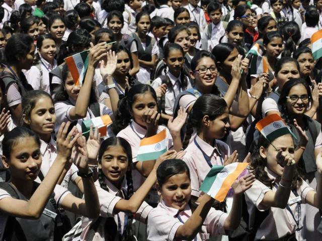 Students of Shri Devi Ahilya Sishu Vihar laud the achievement of scientists after the successful launch of 'Mangalyaan', in Indore on Wednesday. (Amit K Jaiswal/HT photo)