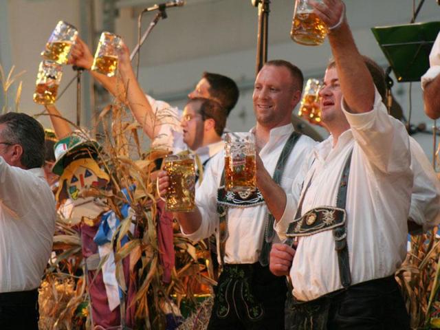 The Oktoberfest tents serve local delicacies such as thirst-provoking oxen, pork knuckles and salty pretzels. But for a less pricey version and possibly more authentic Munich meal, try one of the city's many beer halls or gardens. The Augustiner beer hall in Munich's main pedestrian zone is a favourite after-work meeting spot. The Chinese Tower beer garden in the English Garden park, known for its tall wooden pagoda, is a classic, but farther away from the festivities. Once you are inside a tent, where the oompah of the brass bands mingles with sing-alongs and the cheer of merry drinkers, find a table, order drinks and food, and have fun. Prost! The Oktoberfest tents serve local delicacies such as thirst-provoking oxen, pork knuckles and salty pretzels. But for a less pricey version and possibly more authentic Munich meal, try one of the city's many beer halls or gardens. The Augustiner beer hall in Munich's main pedestrian zone is a favourite after-work meeting spot. The Chinese Tower beer garden in the English Garden park, known for its tall wooden pagoda, is a classic, but farther away from the festivities. Once you are inside a tent, where the oompah of the brass bands mingles with sing-alongs and the cheer of merry drinkers, find a table, order drinks and food, and have fun. Prost!
