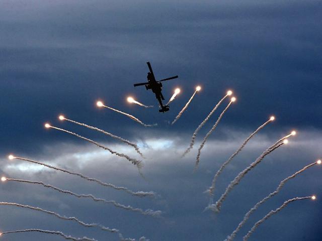 Greece, Athens: September 25 , 2014 A Greek Army Apache helicopter takes part in an air show at Athens Paleo Faliro coastal suburb. (AFP)