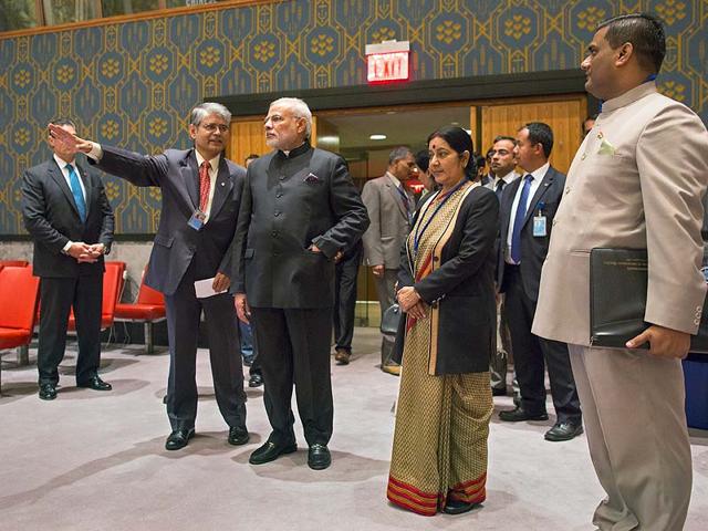 Prime Minister Narendra Modi, is given a tour after arriving at the United Nations during the 69th United Nations General Assembly at UN headquarters. (AP Photo)