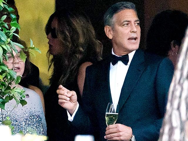 Actor George Clooney attends a cocktail with guests at the Cipriani hotel ahead of his wedding with Amal Alamuddin in Venice. (AP)