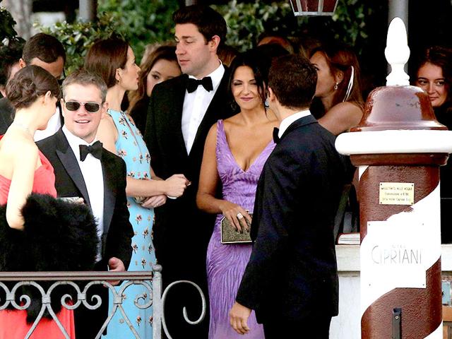 Actor Matt Damon (2nd from left) and his wife Luciana Barroso (2nd from right) arrive to board a taxi boat transporting guests to the venue of a gala dinner ahead of the official wedding ceremony of actor George Clooney and his fiancee Amal Alamuddin in Venice. (Reuters)