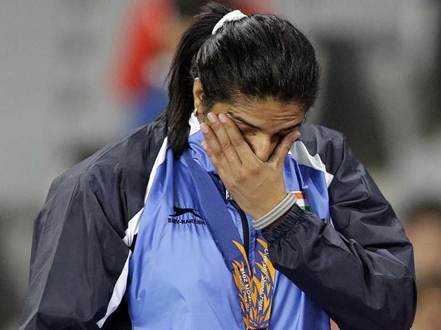 Seema-Punia-wipes-her-tears-after-receiving-the-gold-medal-for-women-s-discus-throw-at-the-17th-Asian-Games-in-Incheon-South-Korea-AP-Photo Seema-Punia-wipes-her-tears-after-receiving-the-gold-medal-for-women-s-discus-throw-at-the-17th-Asian-Games-in-Incheon-South-Korea-AP-Photo