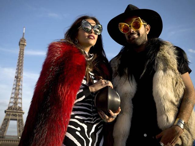 Furry friends: These fashion acolytes appeared at the Rick Owens show in dyed furs and sunglasses. Furry friends: These fashion acolytes appeared at the Rick Owens show in dyed furs and sunglasses.