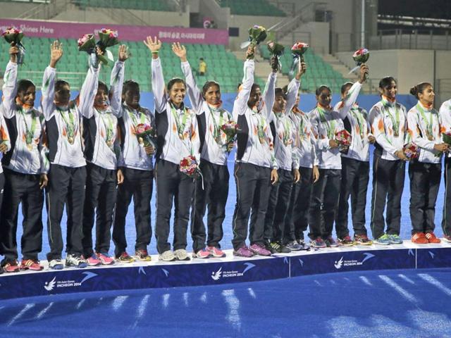 India's team celebrate with their bronze medal during the victory ceremony for the women's hockey at the 17th Asian Games in Incheon. (AP Photo/Dita Alangkara) India's team celebrate with their bronze medal during the victory ceremony for the women's hockey at the 17th Asian Games in Incheon. (AP Photo/Dita Alangkara)