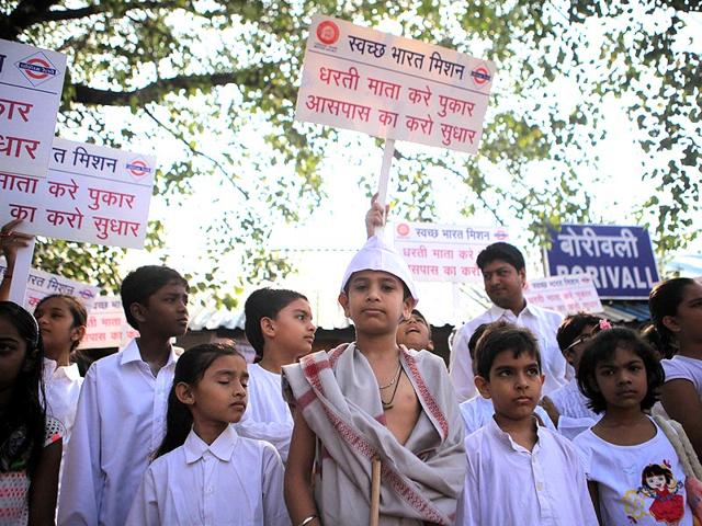 Children-hold-placards-to-support-PM-Modi-s-Swachh-Bharat-campaign-in-Borivali-The-Swachh-Bharat-Abhiyan--aims--to-clean-up-the-country-in-the-next-five-years-Pratham-Gokhale-HT-photo Children-hold-placards-to-support-PM-Modi-s-Swachh-Bharat-campaign-in-Borivali-The-Swachh-Bharat-Abhiyan--aims--to-clean-up-the-country-in-the-next-five-years-Pratham-Gokhale-HT-photo