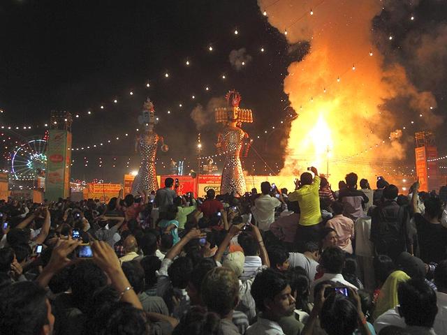 Effigy of Kumbhkaran burns in the Luv Kush Ramlila in the Red Fort area in New Delhi. (Gurinder Osan/HT Photo)
