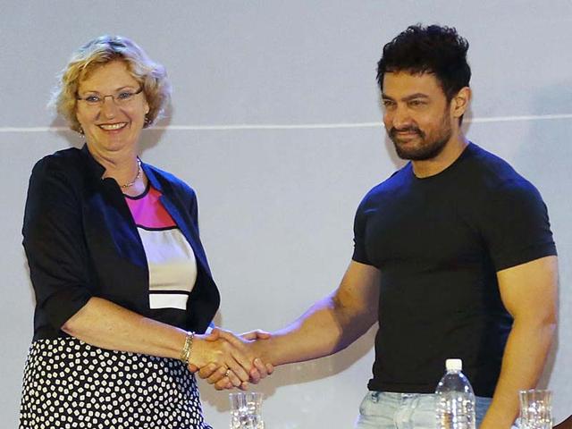 Newly-appointed UNICEF goodwill ambassador for South Asia, Aamir Khan shakes hands with UNICEF South Asia regional director Karin Hulshof during a press conference in Kathmandu. (AFP photo)