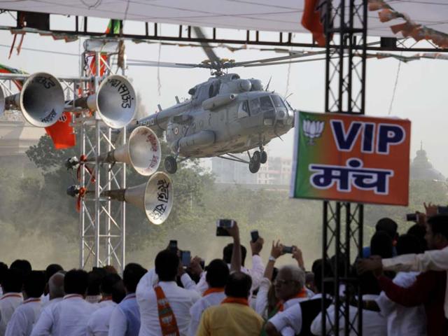PM Modi with his candidate during the 'Vijay Haryana' election rally at Lesiure Valley Ground, Gurgaon. (Parveen Kumar/HT Photo)