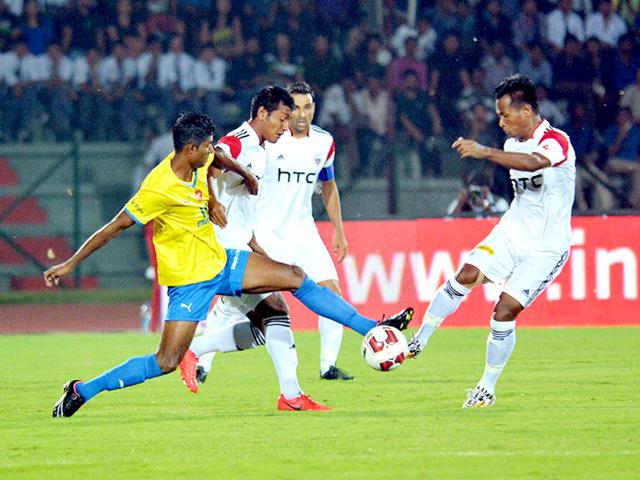 Players-in-action-at-the-Indian-Super-League-ISL-football-match-between-NorthEast-United-FC-white-and-Kerela-Blasters-FC-at-Indira-Gandhi-Athletic-Stadium-in-Guwahati-PTI-Photo