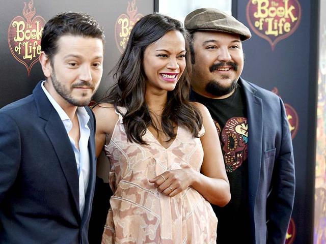 Cast members Diego Luna, Zoe Saldana and director Jorge R Gutierrez pose during the premiere of the film, Book of Life in Los Angeles. (Reuters) Cast members Diego Luna, Zoe Saldana and director Jorge R Gutierrez pose during the premiere of the film, Book of Life in Los Angeles. (Reuters)