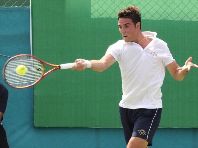 Riccardo Ghedin of Italy plays against India's Sidharth Rawat on the second day of Indore Open ATP Challenger Tennis tournament on Tuesday. (Amit K Jaiswal/HT photo)