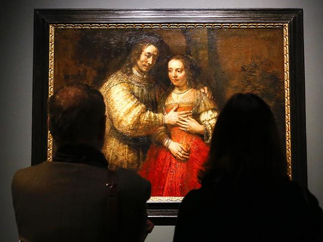 People look at Rembrandt's painting Portrait of a Couple as Isaac and Rebecca, known as The Jewish Bride about 1665 during a media event at The National Gallery in London on October 14, 2014. The National Gallery will be holding an exhibition entitled Rembrant: The Late Works which runs from October 15 until January 18, 2015. (AP) People look at Rembrandt's painting Portrait of a Couple as Isaac and Rebecca, known as The Jewish Bride about 1665 during a media event at The National Gallery in London on October 14, 2014. The National Gallery will be holding an exhibition entitled Rembrant: The Late Works which runs from October 15 until January 18, 2015. (AP)