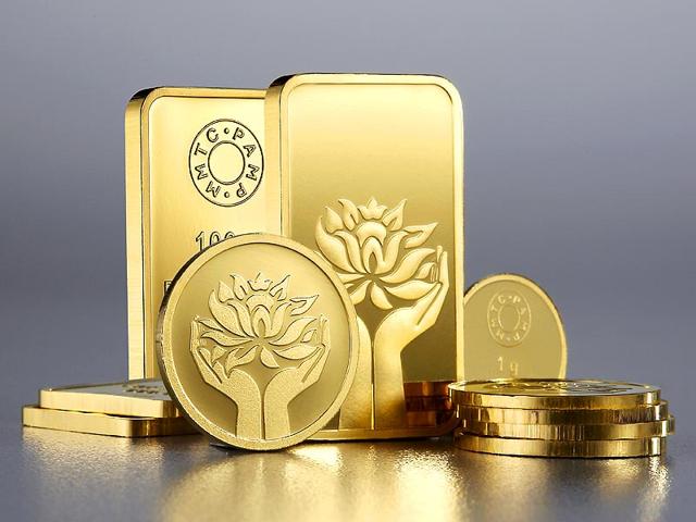 MMTC-PAMP India offers gold and silver coins, ingots and pendants. Etched with designs of two hands holding a lotus flower and the images of Lakshmi and Ganesha. Available with MMTC-PAMP retailers. Price on request