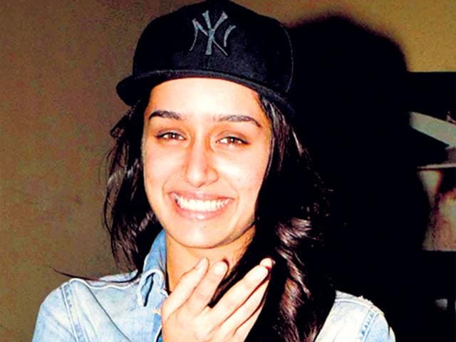 Actor-Shraddha-Kapoor-has-been-showing-off-her-love-for-baseball-caps-in-her-recent-appearances-The-actor-teams-up-a-short-denim-jacket-white-T-shirt-printed-lowers-and-baseball-cap-for-a-relaxed-look