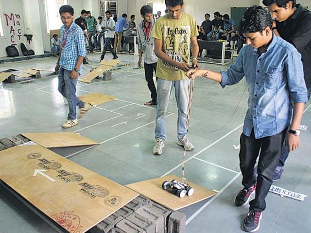 Students-operate-a-robocar-in-Mud-Robo-Warrior-Competion-in-MANIT-Bhopal-on-Sunday-HT-photo