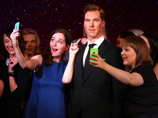Sherlock Holmes never existed, but his fictional address of 221B Baker Street still receives a steady flow of letters addressed to the detective. The latest tribute to Benedict Cumberbatch (who plays the role of Sherlock) comes from Madame Tussauds. Fans takes selfies around the new wax figure of Benedict Cumberbatch as it is unveiled at Madame Tussauds in central London, Tuesday, October 21, 2014. (Photo: AP/Joel Ryan) Sherlock Holmes never existed, but his fictional address of 221B Baker Street still receives a steady flow of letters addressed to the detective. The latest tribute to Benedict Cumberbatch (who plays the role of Sherlock) comes from Madame Tussauds. Fans takes selfies around the new wax figure of Benedict Cumberbatch as it is unveiled at Madame Tussauds in central London, Tuesday, October 21, 2014. (Photo: AP/Joel Ryan)