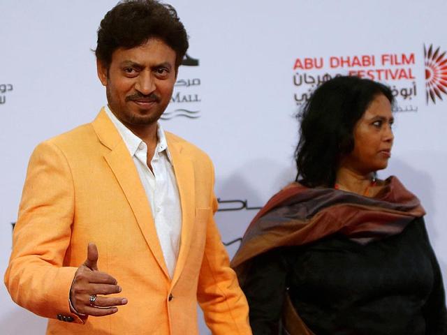 Actor Irfan Khan poses for a picture as he arrives for the opening of 8th edition of the Abu Dhabi Film Festival (ADFF), in Abu Dhabi on October 23, 2014. (AFP)