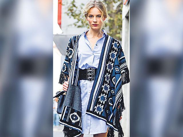 If the early-morning chill doesn’t let you crawl out of your blanket, here’s a trend that suggests you pull the blanket with you and wrap it around your shoulders! Here’s some inspiration from fashion forward ladies who have been rocking the style. (Text: Sanya Goel) | Casually throw your printed blanket jacket over your shoulder when wearing a belted shirt dress, like in the photo below. If the early-morning chill doesn’t let you crawl out of your blanket, here’s a trend that suggests you pull the blanket with you and wrap it around your shoulders! Here’s some inspiration from fashion forward ladies who have been rocking the style. (Text: Sanya Goel) | Casually throw your printed blanket jacket over your shoulder when wearing a belted shirt dress, like in the photo below.
