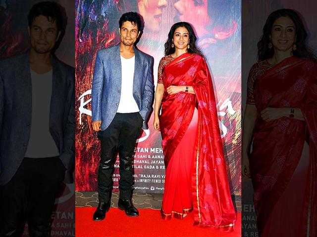 Randeep Hooda poses with Tabu at the screening of Rang Rasiya in Mumbai. (PTI Photo)