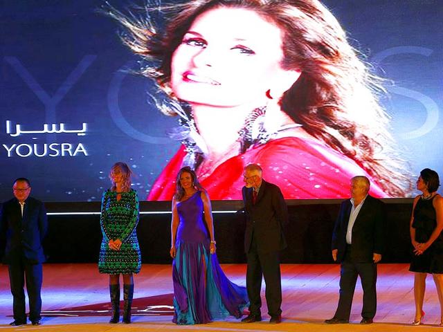 Egyptian actor Yousra (3rd L), the chairperson of the jury of the International Competition, attends with other members of the jury during the opening ceremony of the 36th Cairo International Film Festival (CIFF) at the Citadel of Salah El Din in Cairo November 9, 2014. The festival will end on November 18. (Reuters)