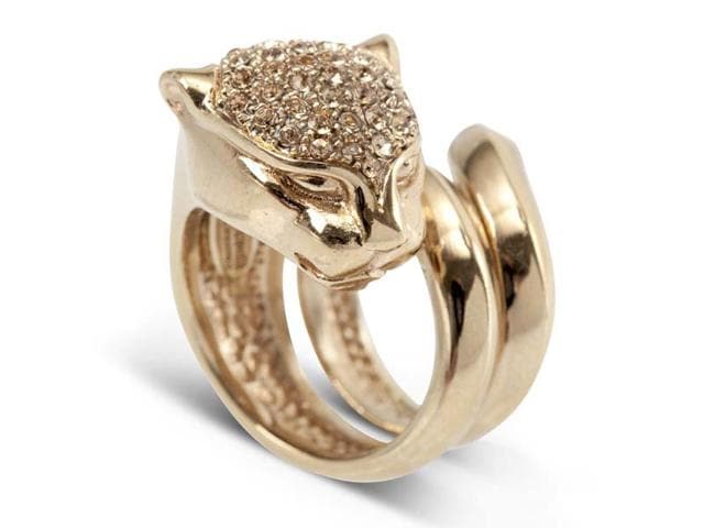Roberto Cavalli ring: This metal and Swarovski crystal ring from Roberto Cavalli will add a little animal magic to any outfit. Why not use it to liven up a little black dress look? €285 (Almost Rs 28,000) Roberto Cavalli ring: This metal and Swarovski crystal ring from Roberto Cavalli will add a little animal magic to any outfit. Why not use it to liven up a little black dress look? €285 (Almost Rs 28,000)