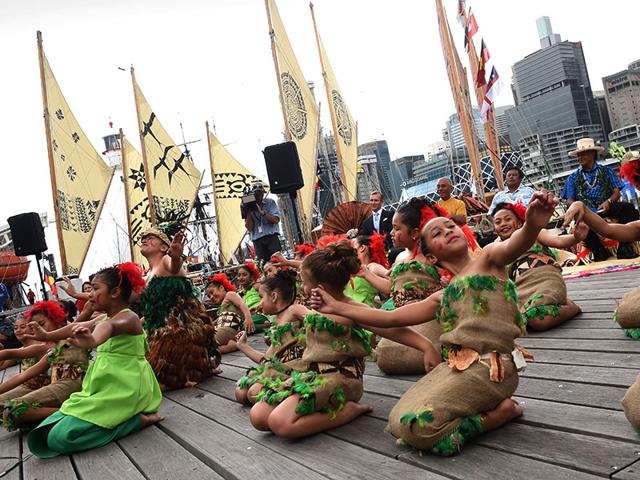 Girls-from-the-pacific-island-nation-of-Tonga-take-part-in-a-traditional-dance-after-arriving-in-Sydney-Traditional-Pacific-island-canoes-sailed-into-Sydney-Harbour-on-after-a-vast-journey-across-the-ocean-bringing-an-urgent-message-to-the-world-about-climate-change-AFP-Photo