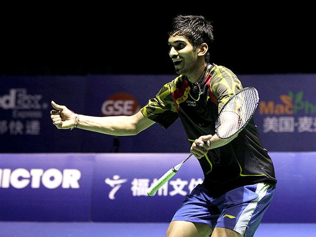 K Srikanth celebrates after beating Lin Dan of China to win the men's singles title at the Badminton China Open in Fuzhou, China's Fujian province. (AFP Photo)