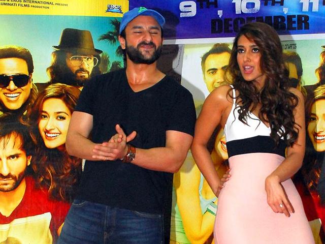 Saif Ali Khan and Ileana D’Cruz pose for the shutterbugs. (AFP Photo)