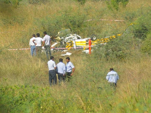 One pilot died and another sustained multiple injuries when a Cessna flight trainer aircraft of MP Flying Club crashed on Indore airport premises on Wednesday. (Arun Mondhe/HT photo)